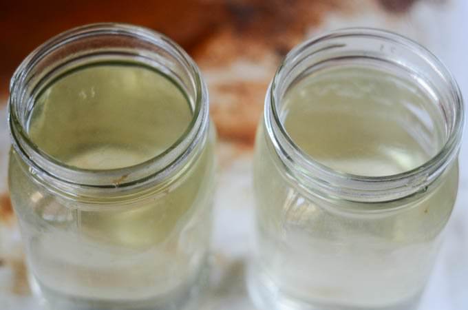 cooled sugar syrup in glass Mason jars