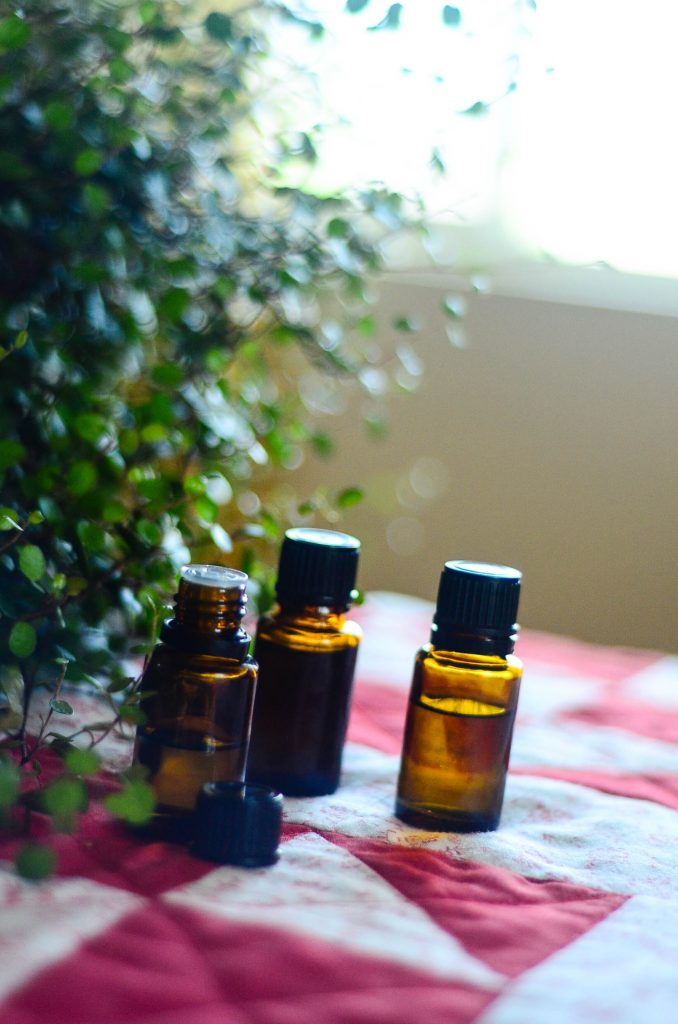Vertical shot of essential oil bottles