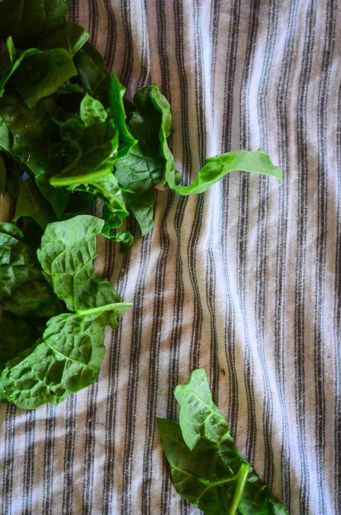 Drying greens on a tea towel after washing... 